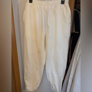White athletic baggy joggers, size medium.